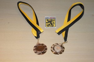 De medailles en het provinciale 'schildje' van Yves.